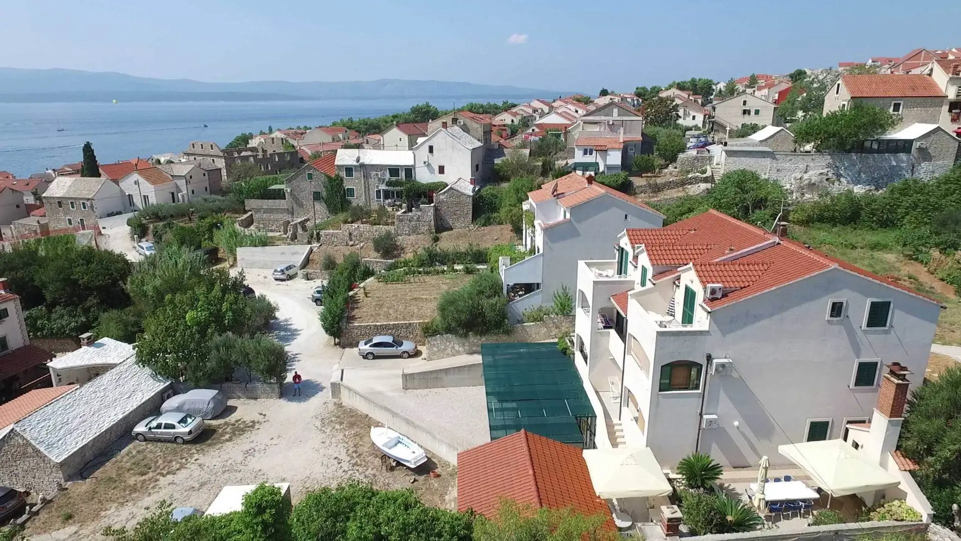 A bird's-eye view of the house from the east Apartments Borovina in Bol Brac - A bird's-eye view of the house from the east